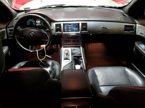 2015 Jaguar XF V6 Portfolio with VIN SAJWJ0FF0F8U72195, listed as a Copart auction lot 84399344 with 115,057 mi miles and Salvage Title. Bid and sale history available at carsss.com. Image 8.