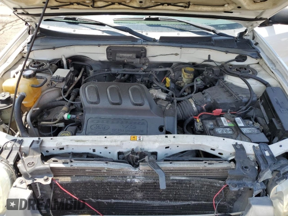 2004 Ford Escape XLS with VIN 1FMCU92114DA15564, listed as a Copart auction lot 59358015 with 186,135 mi miles and Salvage title. Bid and sale history available at DreamBid. Image 12.