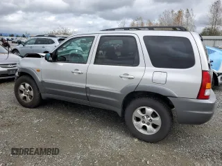 2002 Mazda Tribute LX with VIN 4F2CU08192KM41728, listed as a Copart auction lot 78221954 with 140,782 mi miles and Salvage Title. Bid and sale history available at carsss.com. Image 2.