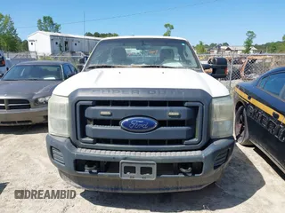 2014 Ford Super Duty F-250 SRW XL with VIN 1FDBF2B67EEA49254, listed as a IAAI auction lot 42136208 with 209,139 mi miles. Bid and sale history available at carsss.com. Image 12.