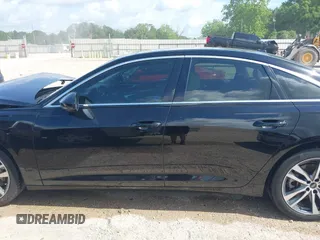 2023 Audi A6 Premium z VIN WAUD3BF2XPN048712, wystawiony jako IAAI lot #42127601 z przebiegiem 52 303 mil mil oraz . Historia ofert i sprzedaży dostępna na DreamBid. Obrazek 14.