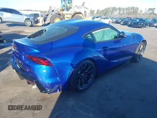 2023 Toyota GR Supra 3.0 with VIN WZ1DB0G01PW057818, listed as a IAAI auction lot 41405386 with 18 mi miles. Bid and sale history available at carsss.com. Image 4.