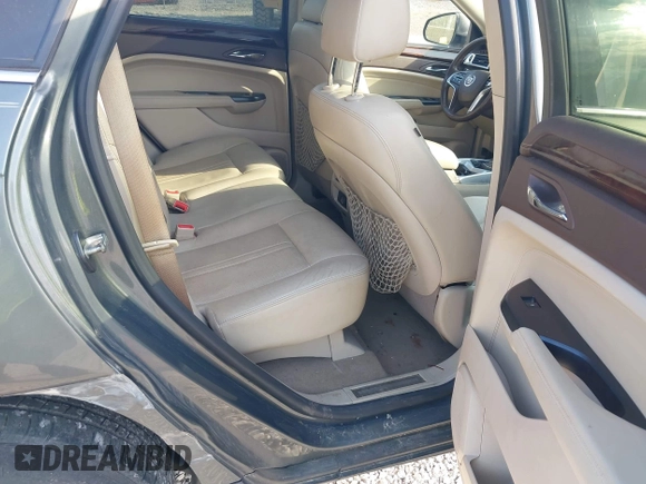 2013 Cadillac SRX Luxury Collection with VIN 3GYFNCE31DS587415, listed as a IAAI auction lot 42020500 with 279,638 mi miles and . Bid and sale history available at DreamBid. Image 8.