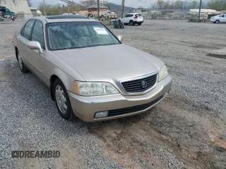 2001 Acura RL w/Navigation System with VIN JH4KA96661C002128, listed as a IAAI auction lot 42000924 with 180,205 mi miles. Bid and sale history available at carsss.com. Image 1.