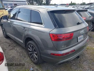 2017 Audi Q7 Premium with VIN WA1AAAF71HD010675, listed as a IAAI auction lot 41956959 with 136,549 mi miles and . Bid and sale history available at DreamBid. Image 3.