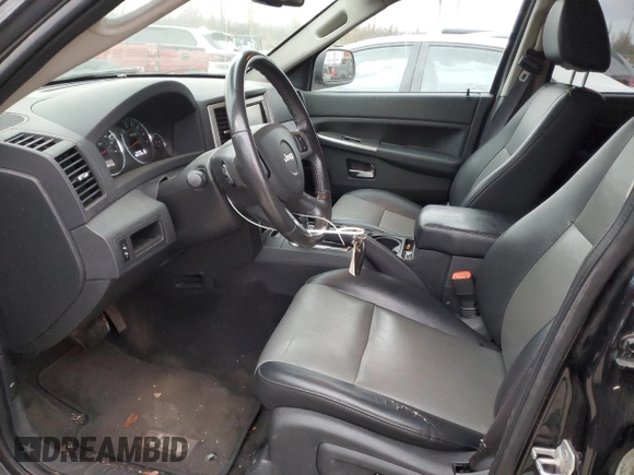 2009 Jeep Grand Cherokee Laredo with VIN 1J8HR48P19C514557, listed as a Copart auction lot 81830634 with 109,811 mi miles and Salvage Title. Bid and sale history available at carsss.com. Image 7.