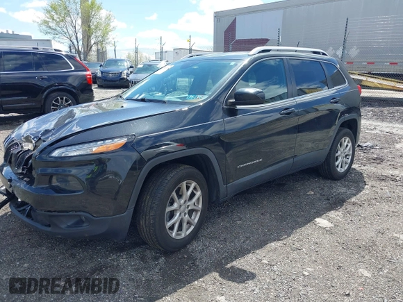 2014 Jeep Cherokee Latitude with VIN 1C4PJMCS8EW257959, listed as a IAAI auction lot 41987529 with 124,749 mi miles. Bid and sale history available at carsss.com. Image 21.