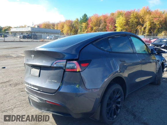 2020 Tesla Model Y Long Range with VIN 5YJYGDEE0LF041762, listed as a IAAI auction lot 40556913 with Not Provided miles and . Bid and sale history available at DreamBid. Image 4.