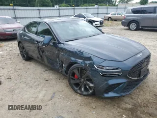 2022 Genesis G70 3.3T with VIN KMTG54TEXNU083193, listed as a Copart auction lot 56627395 with 16,980 mi miles and Salvage title. Bid and sale history available at DreamBid. Image 4.