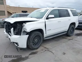 2019 GMC Yukon SLT with VIN 1GKS2BKC3KR160060, listed as a IAAI auction lot 42042122 with 124,733 mi miles. Bid and sale history available at carsss.com. Image 18.