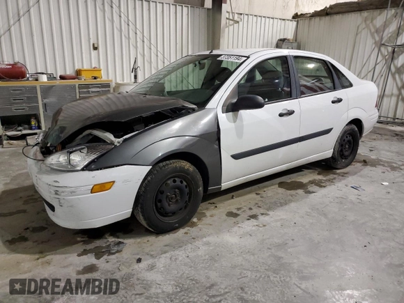 2002 Ford Focus LX with VIN 1FAFP33P52W126344, listed as a Copart auction lot 49757324 with 140,612 mi miles and Salvage Title. Bid and sale history available at DreamBid. Image 1.
