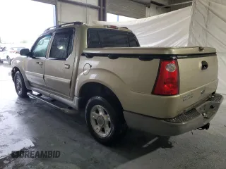 2003 Ford Explorer Sport Trac XLS with VIN 1FMZU67E53UA09799, listed as a Copart auction lot 56620165 with 196,896 mi miles and Salvage title. Bid and sale history available at DreamBid. Image 2.