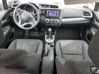 2015 Honda Fit LX z VIN 3HGGK5H58FM768130, wystawiony jako Copart lot #58184435 z przebiegiem 67 968 mil mil oraz Szkoda całkowita • Salvage title. Historia ofert i sprzedaży dostępna na DreamBid. Obrazek 8.