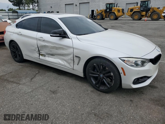 2015 BMW 4 Series 428i xDrive with VIN WBA4C9C59FD331372, listed as a Copart auction lot 58628665 with 81,245 mi miles and Salvage title. Bid and sale history available at DreamBid. Image 4.