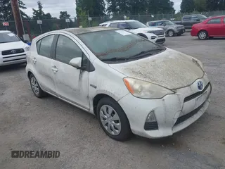 2013 Toyota Prius One with VIN JTDKDTB35D1542832, listed as a IAAI auction lot 42738476 with 143,327 mi miles and . Bid and sale history available at DreamBid. Image 1.