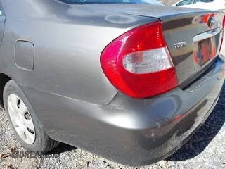 2004 Toyota Camry LE with VIN 4T1BE32K54U904138, listed as a IAAI auction lot 41792208 with 217,829 mi miles and . Bid and sale history available at carsss.com. Image 14.