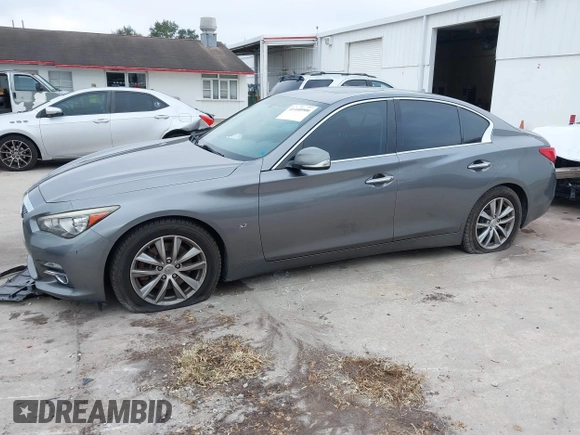 2015 Infiniti Q50 with VIN JN1BV7AP7FM357534, listed as a IAAI auction lot 41440900 with 101,982 mi miles. Bid and sale history available at carsss.com. Image 14.