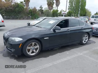 2012 BMW 5 Series 528i with VIN WBAXG5C55CDX02405, listed as a IAAI auction lot 42127069 with 155,764 mi miles. Bid and sale history available at carsss.com. Image 2.