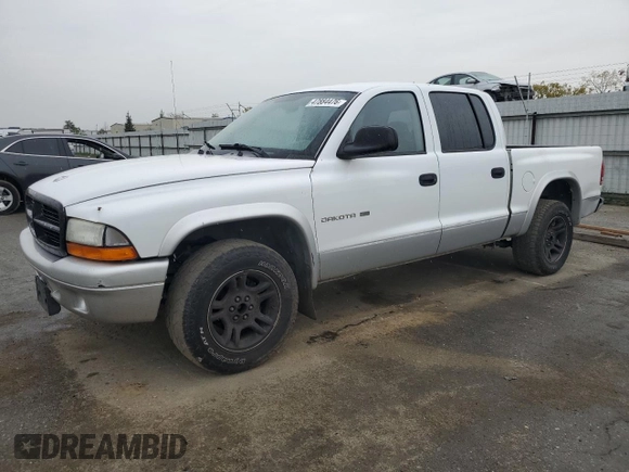 2002 Dodge Dakota SLT z VIN 1B7HL48N22S636413, wystawiony jako Copart lot #47884475 z przebiegiem 226 723 mil mil oraz Czysty tytuł • Clean title. Historia ofert i sprzedaży dostępna na DreamBid. Obrazek 1.