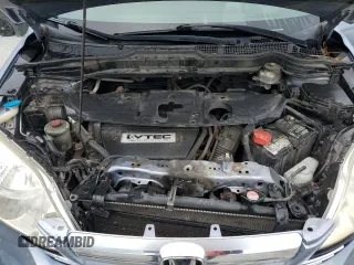 2009 Honda CR-V EX-L z VIN JHLRE48709C008700, wystawiony jako Copart lot #57402055 z przebiegiem 162 825 mil mil oraz Szkoda całkowita • Salvage title. Historia ofert i sprzedaży dostępna na DreamBid. Obrazek 12.