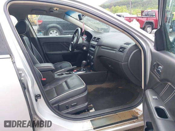2012 Ford Fusion SEL with VIN 3FAHP0JG6CR191735, listed as a IAAI auction lot 42365977 with 128,023 mi miles and . Bid and sale history available at DreamBid. Image 5.