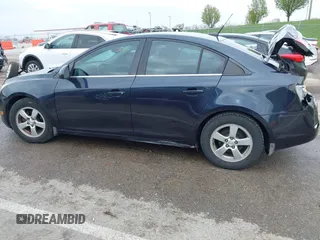 2014 Chevrolet Cruze 1LT with VIN 1G1PC5SB5E7400967, listed as a IAAI auction lot 41976254 with 143,068 mi miles and . Bid and sale history available at DreamBid. Image 15.