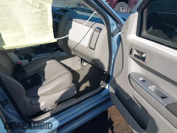 2008 Mercury Mariner with VIN 4M2CU29H48KJ31996, listed as a IAAI auction lot 41643311 with 151,195 mi miles. Bid and sale history available at carsss.com. Image 5.