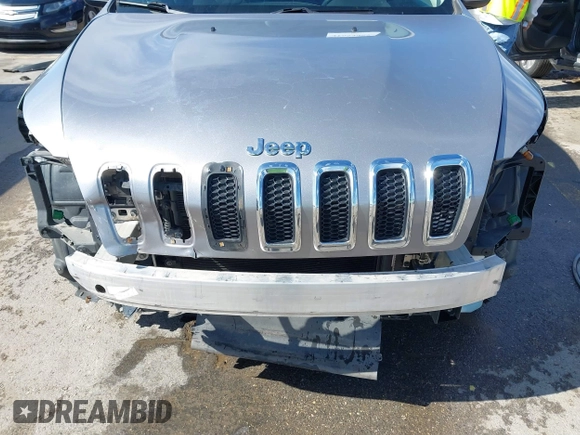 2015 Jeep Cherokee Latitude with VIN 1C4PJLCB8FW620336, listed as a IAAI auction lot 41634997 with 130,335 mi miles. Bid and sale history available at carsss.com. Image 6.