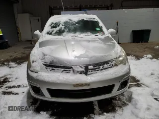 2007 Nissan Versa 1.8 S with VIN 3N1BC13E77L450063, listed as a Copart auction lot 42299135 with 81,821 mi miles and Salvage Title. Bid and sale history available at carsss.com. Image 5.