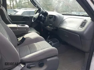 2003 Ford F-150 XL with VIN 1FTRX18W43NB84285, listed as a IAAI auction lot 41494919 with 197,352 mi miles. Bid and sale history available at carsss.com. Image 5.