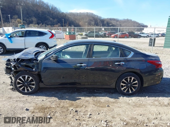 2018 Nissan Altima SR with VIN 1N4AL3AP9JC239996, listed as a IAAI auction lot 41822378 with 118,690 mi miles and . Bid and sale history available at carsss.com. Image 14.