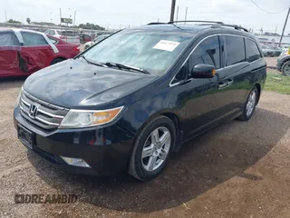 2013 Honda Odyssey Touring with VIN 5FNRL5H95DB086041, listed as a IAAI auction lot 42477974 with 213,343 mi miles and . Bid and sale history available at DreamBid. Image 17.