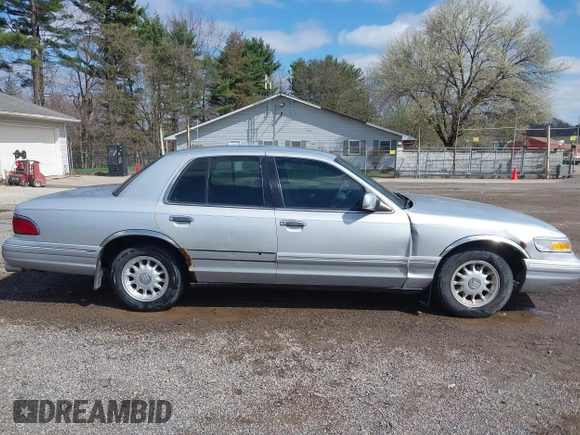 1997 Mercury Grand Marquis LS with VIN 2MELM75W3VX717801, listed as a IAAI auction lot 41920075 with 173,730 mi miles and . Bid and sale history available at DreamBid. Image 13.
