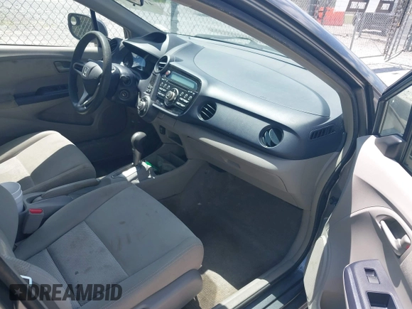 2010 Honda Insight LX with VIN JHMZE2H56AS002473, listed as a IAAI auction lot 41983606 with Not Provided miles and . Bid and sale history available at DreamBid. Image 5.