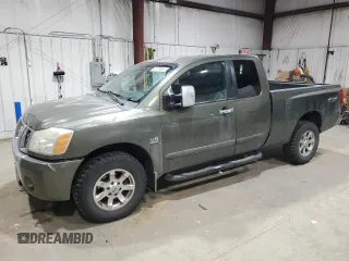 2004 Nissan Titan SE z VIN 1N6AA06B64N577521, wystawiony jako Copart lot #48779805 z przebiegiem 244 299 mil mil oraz Czysty tytuł • Clean title. Historia ofert i sprzedaży dostępna na DreamBid. Obrazek 1.