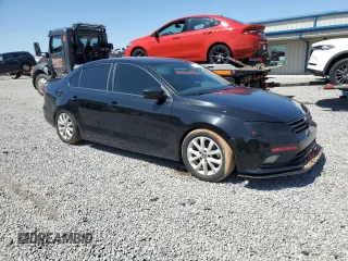 2015 Volkswagen Jetta SE with VIN 3VWD07AJ0FM414285, listed as a Copart auction lot 51930645 with 136,618 mi miles and Salvage title. Bid and sale history available at DreamBid. Image 4.