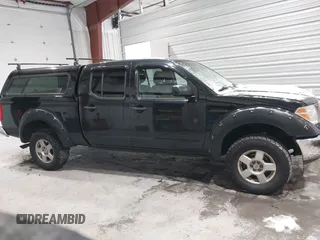 2007 Nissan Frontier SE with VIN 1N6AD09W17C447779, listed as a IAAI auction lot 41362259 with 142,153 mi miles. Bid and sale history available at carsss.com. Image 12.