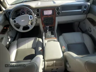 2010 Jeep Commander Limited with VIN 1J4RG5GT1AC129682, listed as a Copart auction lot 55215375 with 36,906 mi miles and Salvage title. Bid and sale history available at DreamBid. Image 8.