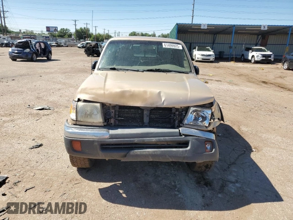 1999 Toyota Tacoma with VIN 4TAWN72N4XZ560411, listed as a Copart auction lot 61499925 with 395,215 mi miles and Salvage title. Bid and sale history available at DreamBid. Image 5.