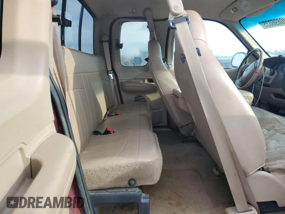 1999 Ford F-150 XL z VIN 2FTRX18L3XCA55634, wystawiony jako Copart lot #49896035 z przebiegiem 212 928 mil mil oraz Czysty tytuł • Clean title. Historia ofert i sprzedaży dostępna na DreamBid. Obrazek 10.