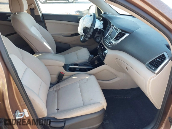 2017 Hyundai Tucson SE with VIN KM8J23A40HU525982, listed as a IAAI auction lot 41790898 with 107,715 mi miles. Bid and sale history available at carsss.com. Image 5.