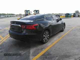 2016 Nissan Maxima SR with VIN 1N4AA6AP9GC428938, listed as a IAAI auction lot 42419663 with 121,501 mi miles and . Bid and sale history available at DreamBid. Image 4.