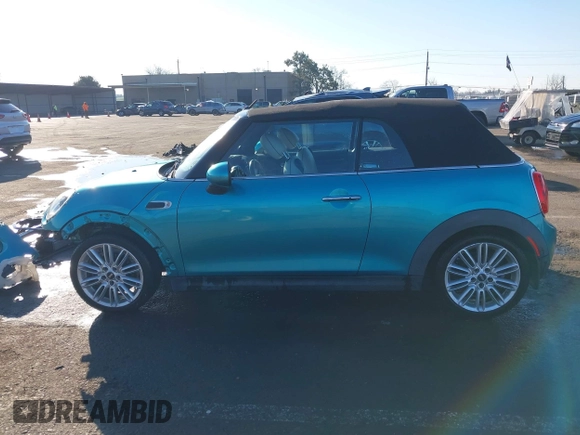 2016 MINI Convertible z VIN WMWWG5C50G3C19656, wystawiony jako IAAI lot #41429611 z przebiegiem 60 873 mil mil oraz . Historia ofert i sprzedaży dostępna na DreamBid. Obrazek 15.