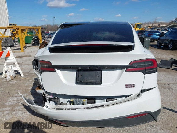 2023 Tesla Model X Plaid with VIN 7SAXCBE63PF405105, listed as a IAAI auction lot 41876918 with 22,475 mi miles and . Bid and sale history available at DreamBid. Image 17.