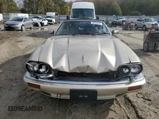 1996 Jaguar XJS with VIN SAJNX2742TC224462, listed as a Copart auction lot 79755744 with 120,724 mi miles and Salvage Title. Bid and sale history available at carsss.com. Image 5.
