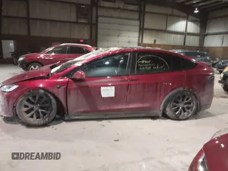 2023 Tesla Model X with VIN 7SAXCDE51PF403632, listed as a IAAI auction lot 41328722 with Not Provided miles and . Bid and sale history available at DreamBid. Image 13.