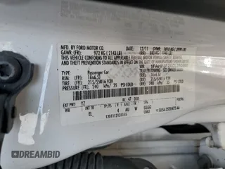 2012 Ford Focus SE z VIN 1FAHP3F2XCL310660, wystawiony jako Copart lot #60217625 z przebiegiem 208 807 mil mil oraz Szkoda całkowita • Salvage title. Historia ofert i sprzedaży dostępna na DreamBid. Obrazek 12.