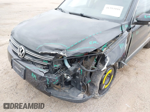 2016 Volkswagen Tiguan S with VIN WVGBV7AX9GW566451, listed as a IAAI auction lot 41393999 with 51,616 mi miles and . Bid and sale history available at DreamBid. Image 6.