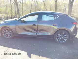 2020 Mazda 3 with VIN JM1BPBLMXL1160464, listed as a IAAI auction lot 42127954 with 70,073 mi miles and . Bid and sale history available at DreamBid. Image 14.