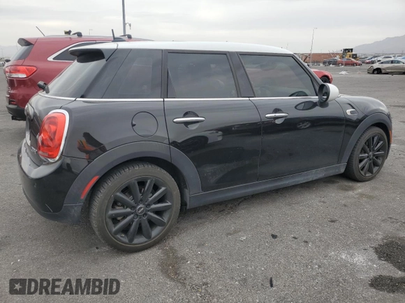 2017 MINI Hardtop 4 Door Cooper with VIN WMWXU1C30H2E19304, listed as a Copart auction lot 51008575 with 34,526 mi miles and Salvage Title. Bid and sale history available at DreamBid. Image 3.